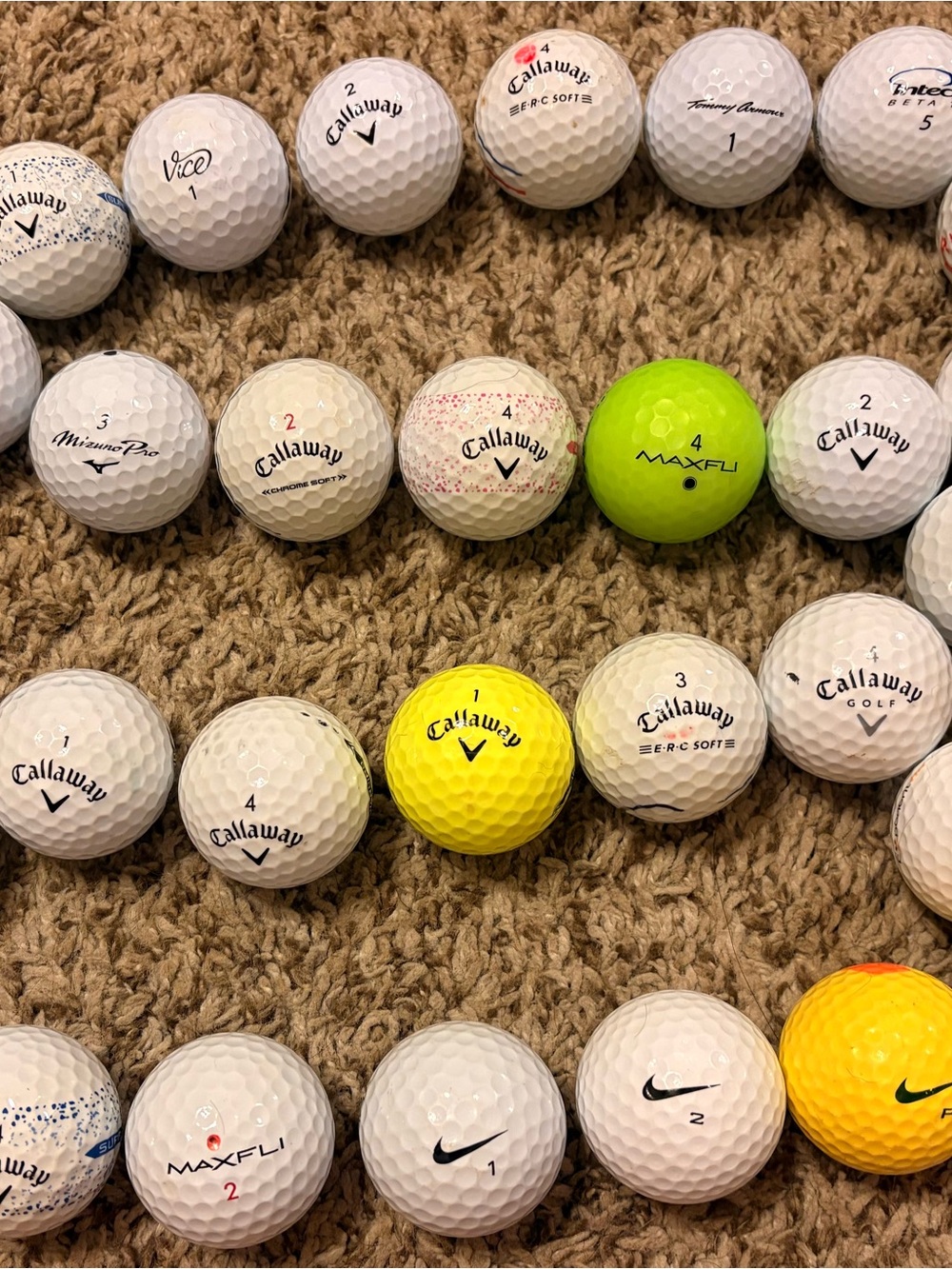 Mixed Brands of Golf Balls. These balls are used and may have marks on them.